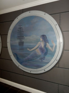 Closeup of Mermaid Porthole