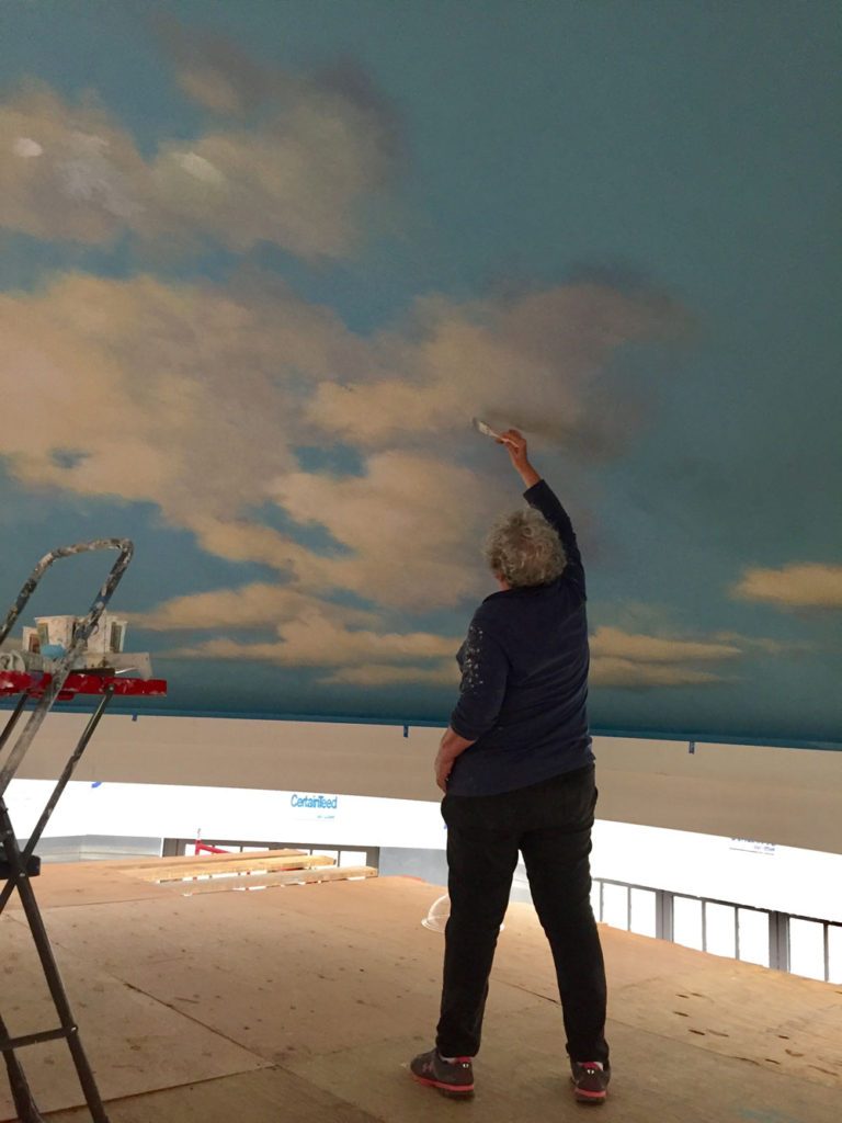 Sharon painting clouds