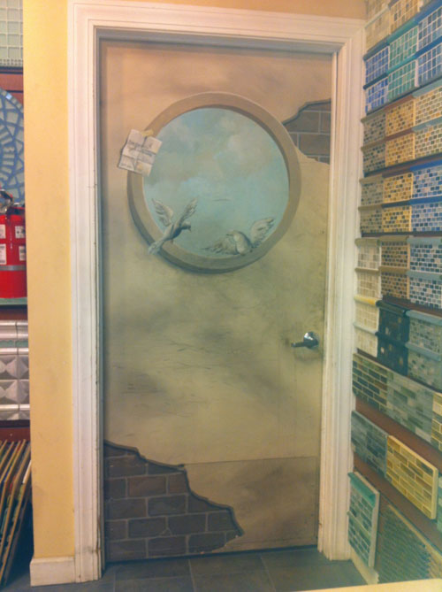 Door with birds through porthole