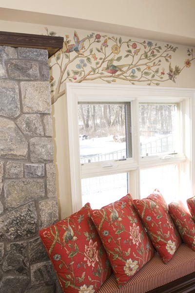 Branches and bird motifs on window