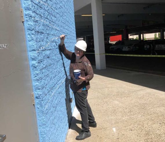 Sharon girdding the wall