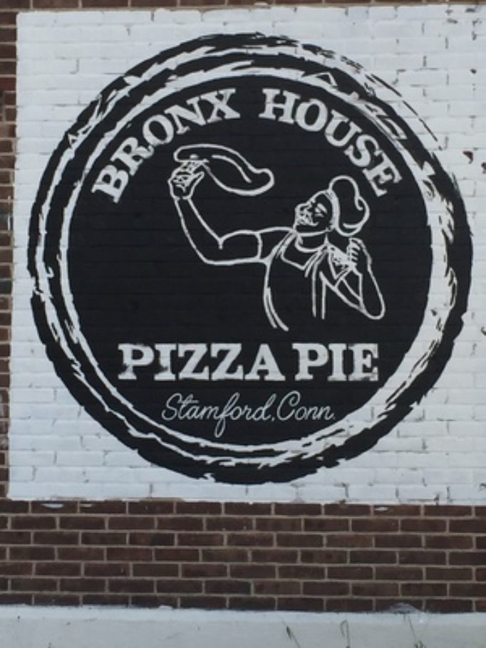 Painting on brick in restaurant in the Bronx