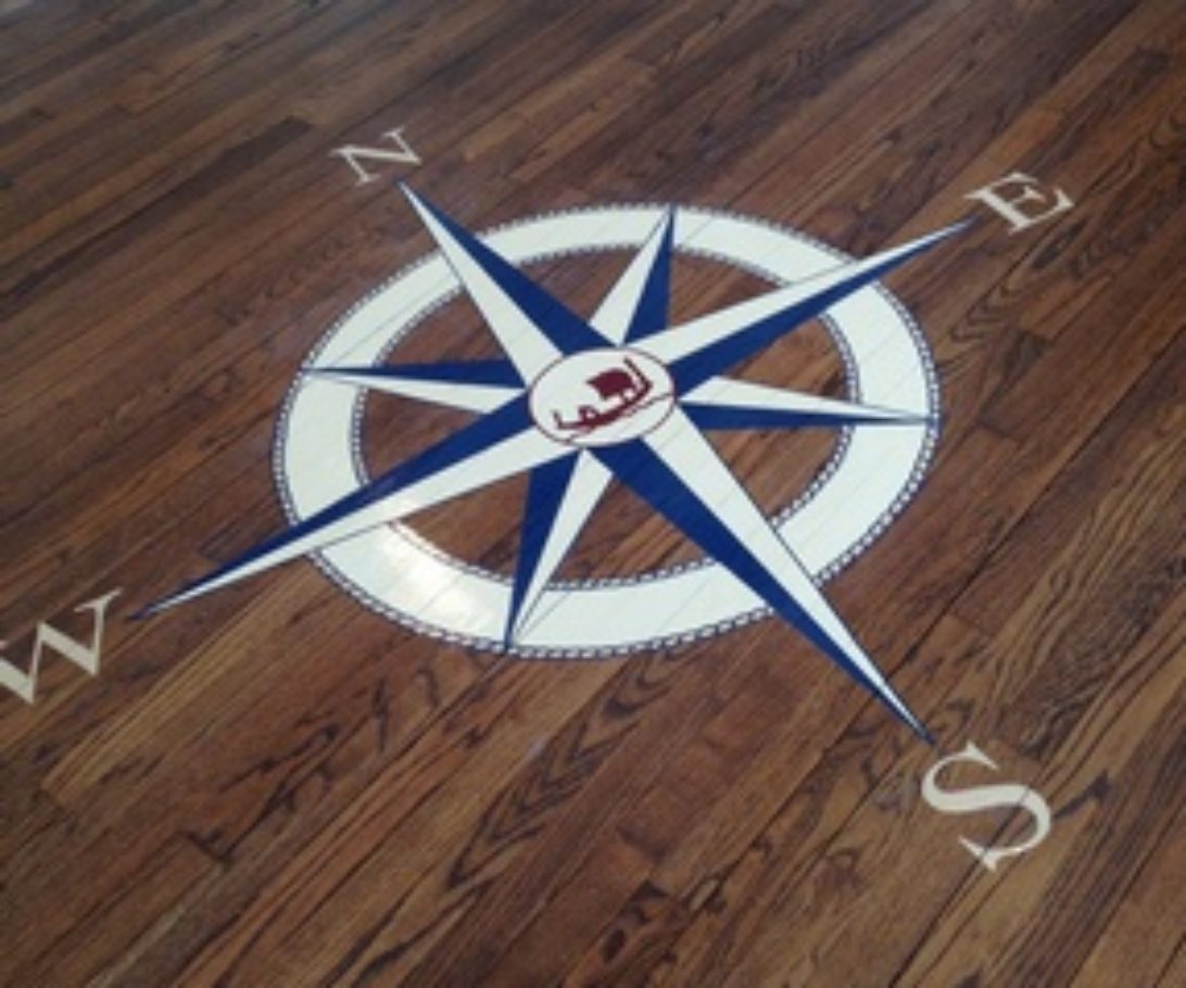 Compass on floor in yacht club
