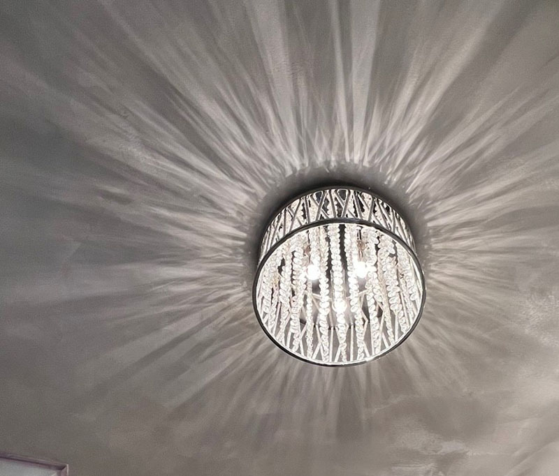 Wall shimmering from light fixture