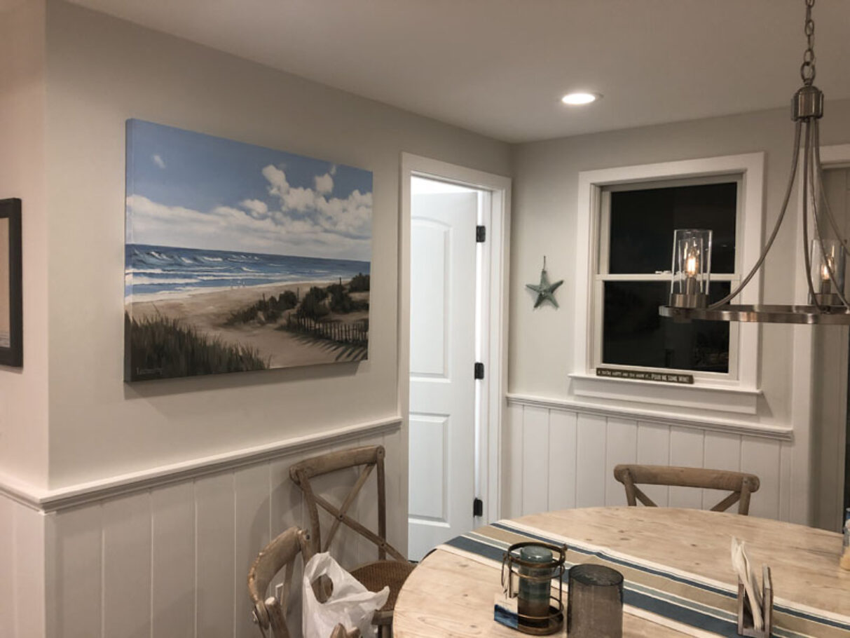 Beach artwork in place in beach house