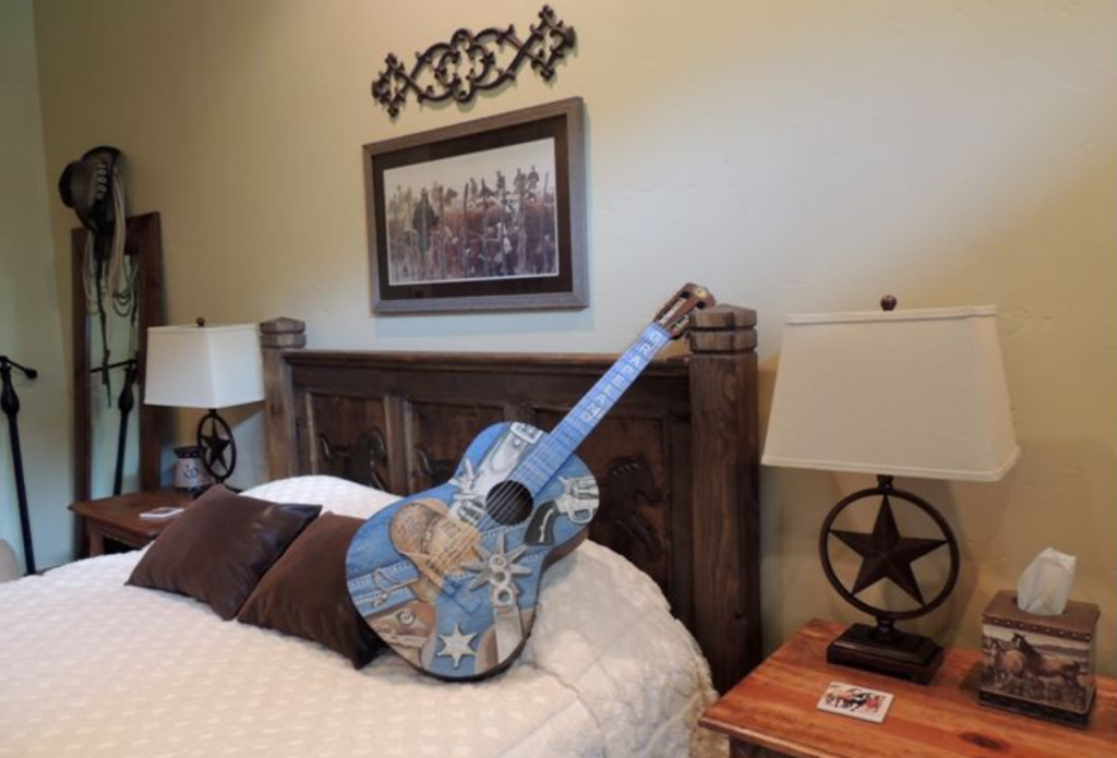 Guitar in cowboy bedroom