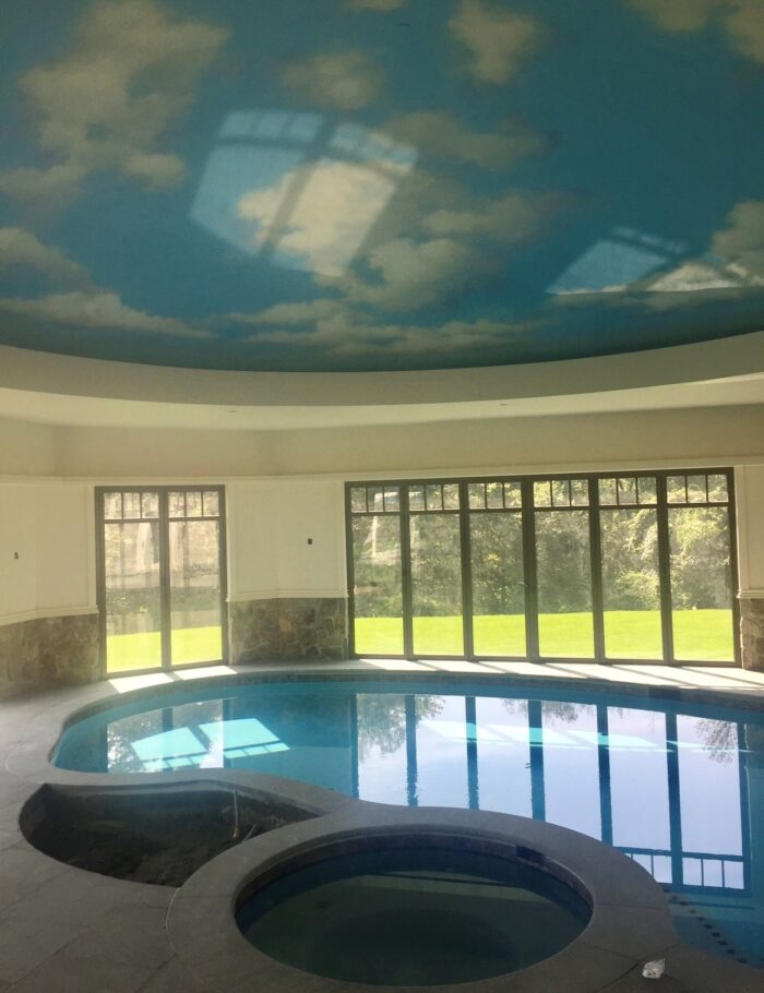 Clouds painted over pool